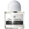 Perfume bottle of Skin Touched by Ocean Salt by Bois et Fleurs Parfums, featuring creamy coconut, lemon, sea salt, oceanic cashmeran, ambroxan, and patchouli oil.