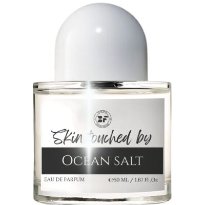 Perfume bottle of Skin Touched by Ocean Salt by Bois et Fleurs Parfums, featuring creamy coconut, lemon, sea salt, oceanic cashmeran, ambroxan, and patchouli oil.