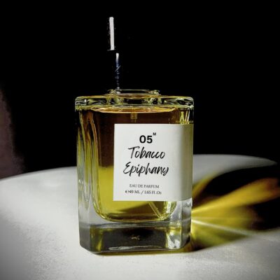 Perfume bottle of Tobacco Epiphany by Bois et Fleurs Parfums, with rich notes of mandarin, plum, honey, dark spices, tobacco, oud, and vanilla.