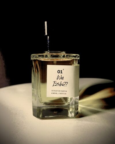 Perfume bottle of Wu Izshi by Bois et Fleurs Parfums, featuring lush raspberry jam, litchi, sugared rose, warm benzoin, and earthy patchouli.